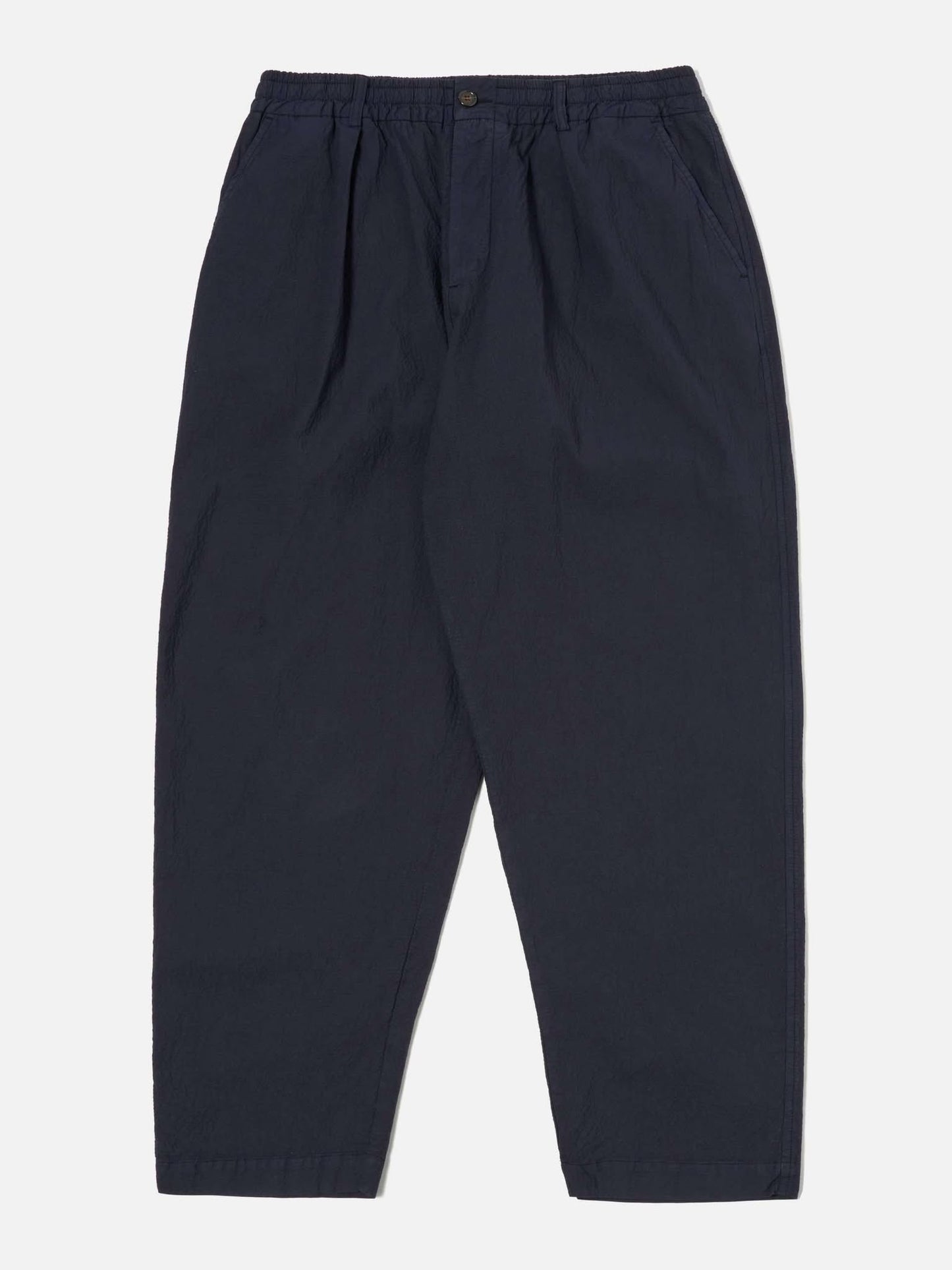 UNIVERSAL WORKS PLEATED TRACK PANT SEERSUCKER II - NAVY