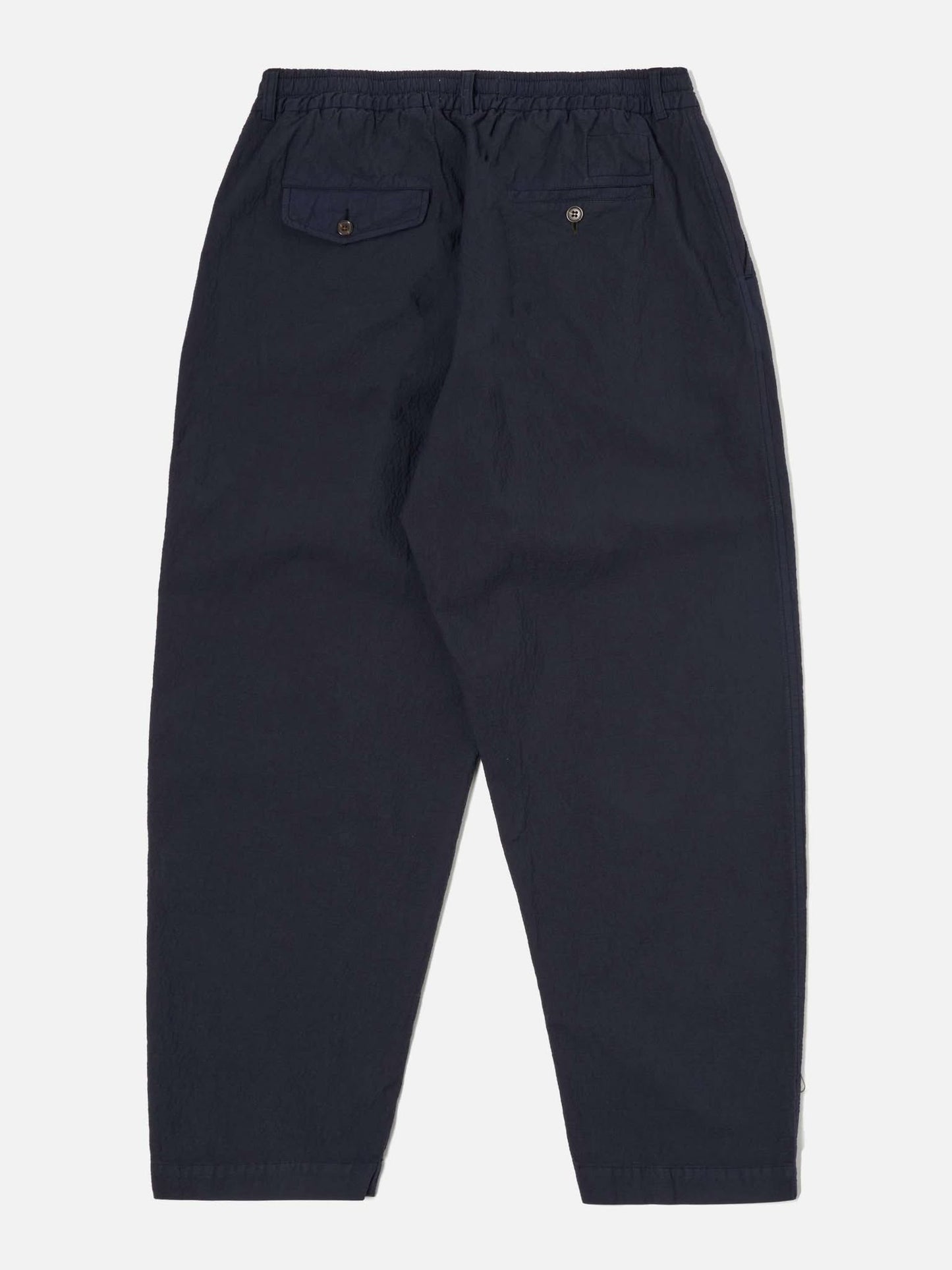 UNIVERSAL WORKS PLEATED TRACK PANT SEERSUCKER II - NAVY