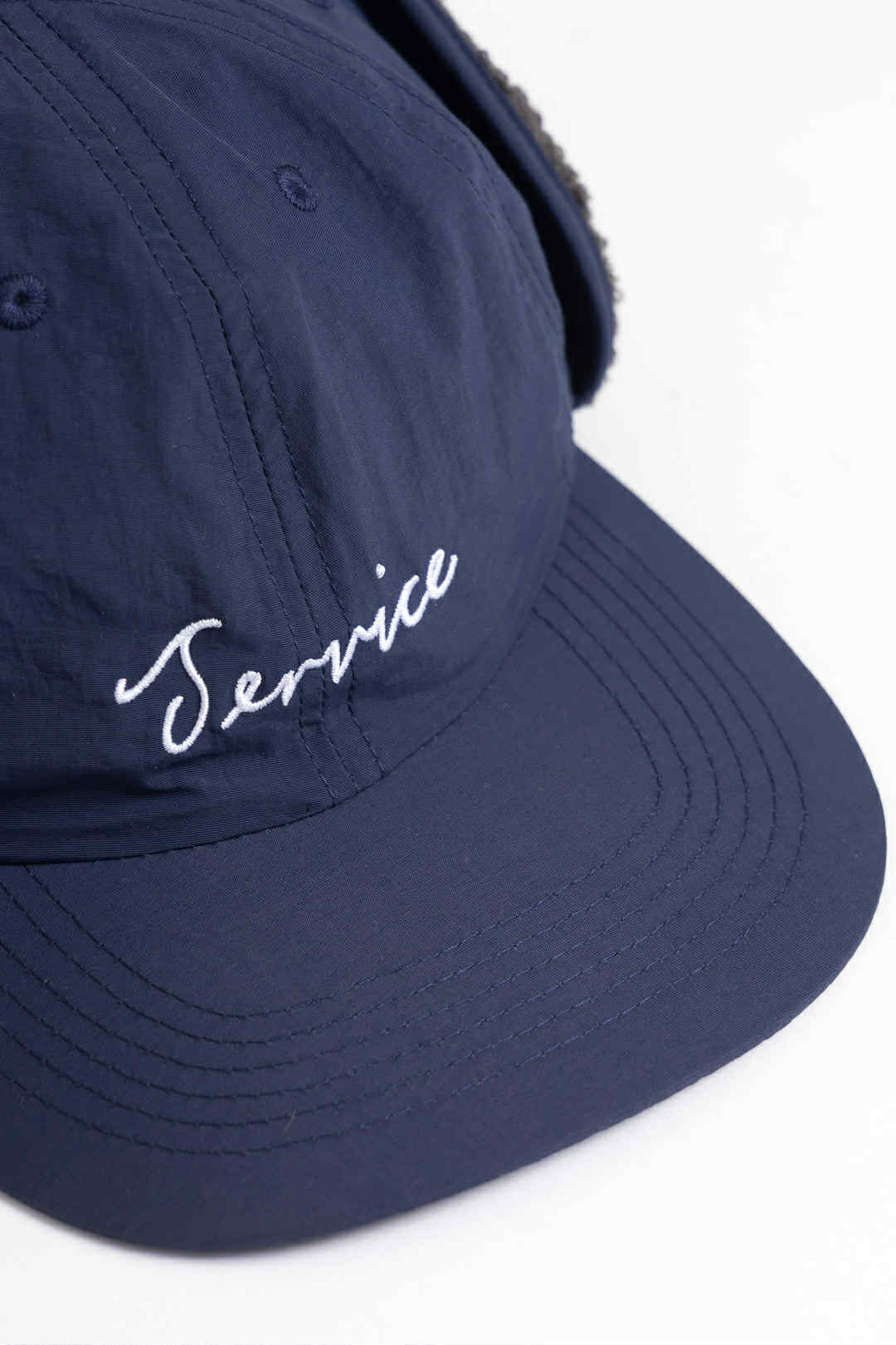 SERVICE WORKS SCRIPT TRAPPER CAP - NAVY