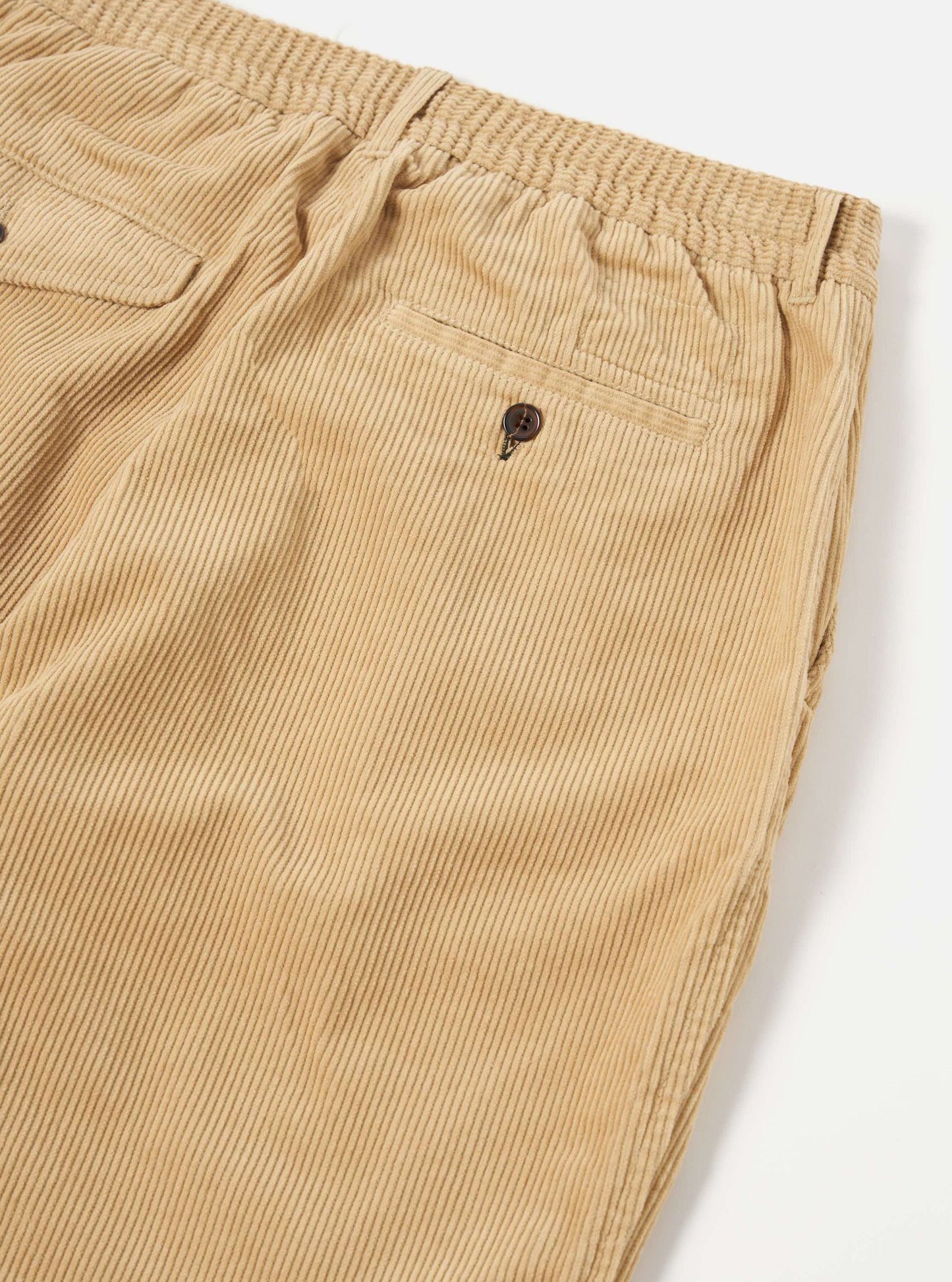 UNIVERSAL WORKS PLEATED TRACK PANT CORD - FAWN