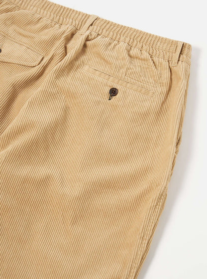 UNIVERSAL WORKS PLEATED TRACK PANT CORD - FAWN