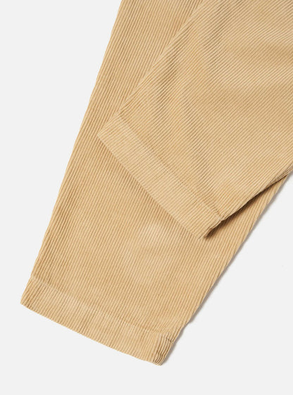 UNIVERSAL WORKS PLEATED TRACK PANT CORD - FAWN