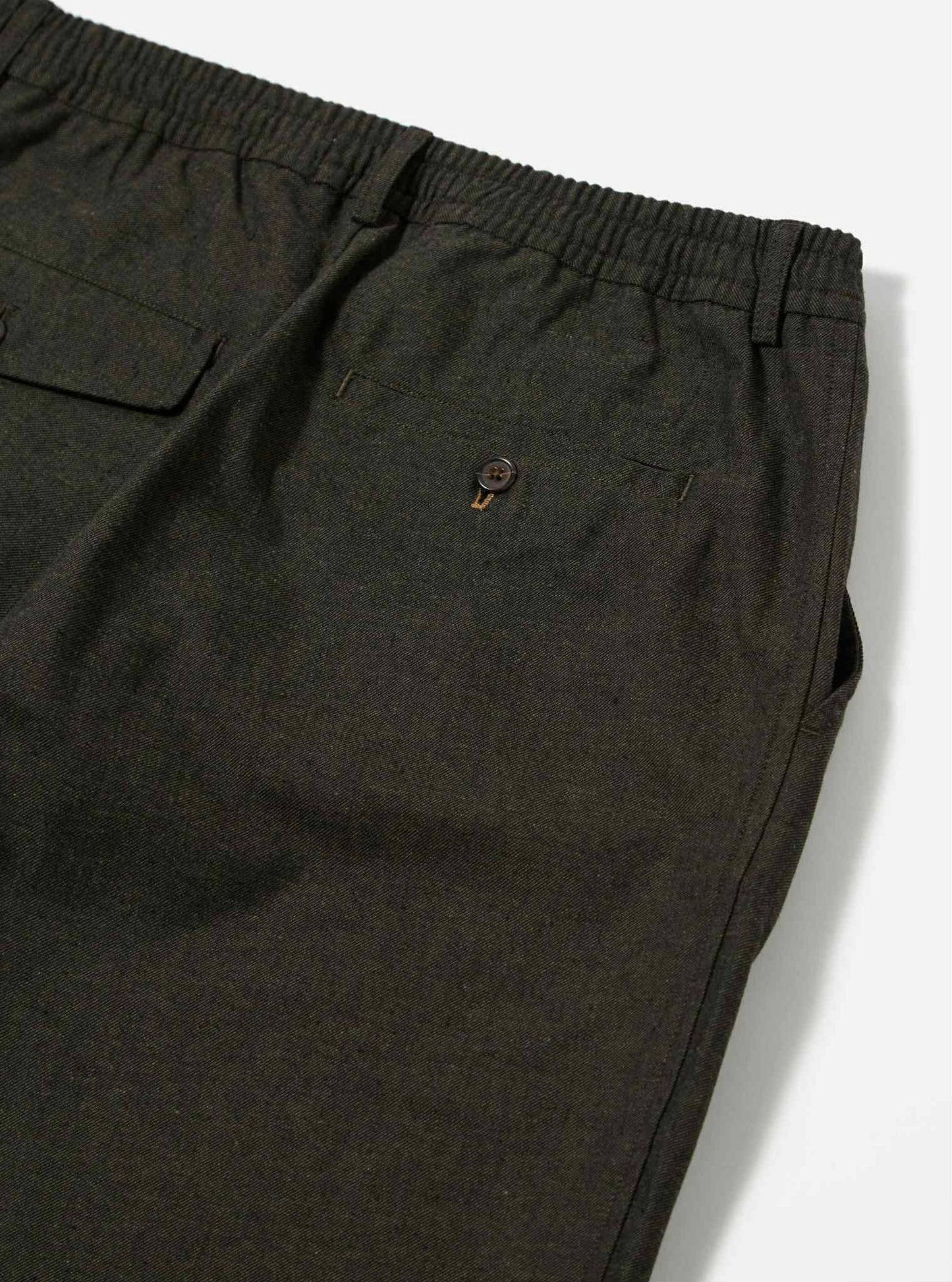 UNIVERSAL WORKS PLEATED TRACK PANT LUCCA SUITING - OLIVE