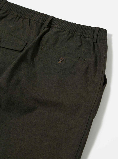 UNIVERSAL WORKS PLEATED TRACK PANT LUCCA SUITING - OLIVE