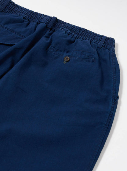 UNIVERSAL WORKS PLEATED TRACK PANT KIMSTOP - INDIGO