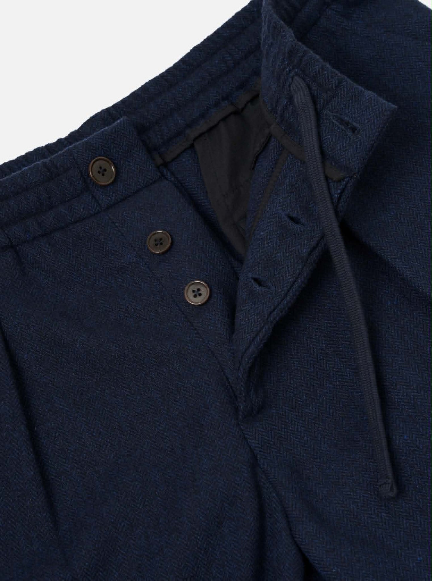 UNIVERSAL WORKS PLEATED TRACK PANT HERRINGBONE WOOL - NAVY
