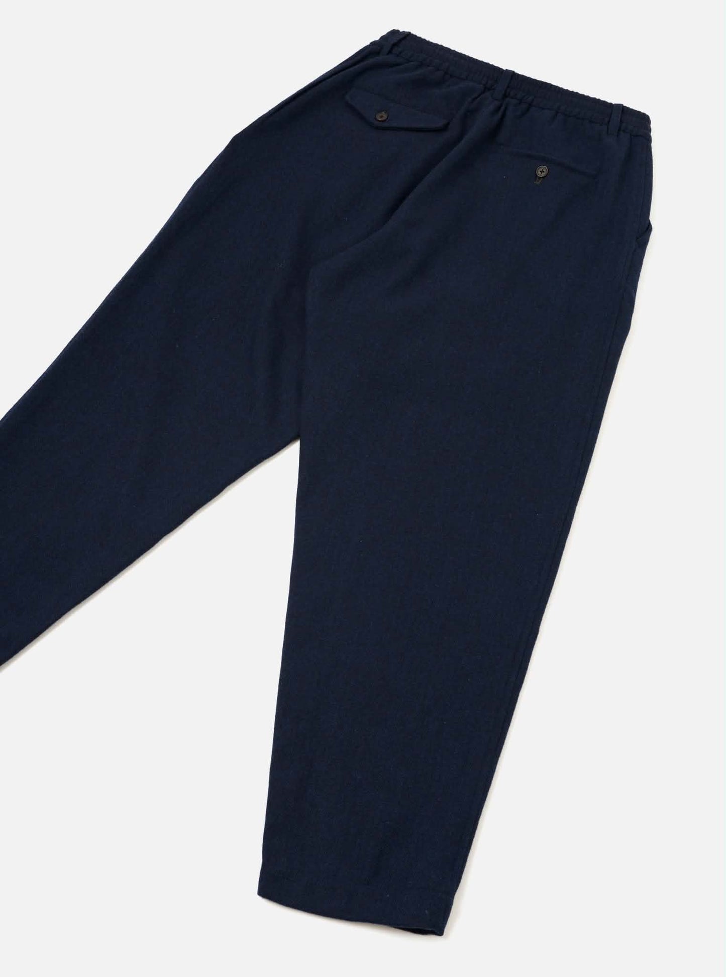 UNIVERSAL WORKS PLEATED TRACK PANT HERRINGBONE WOOL - NAVY